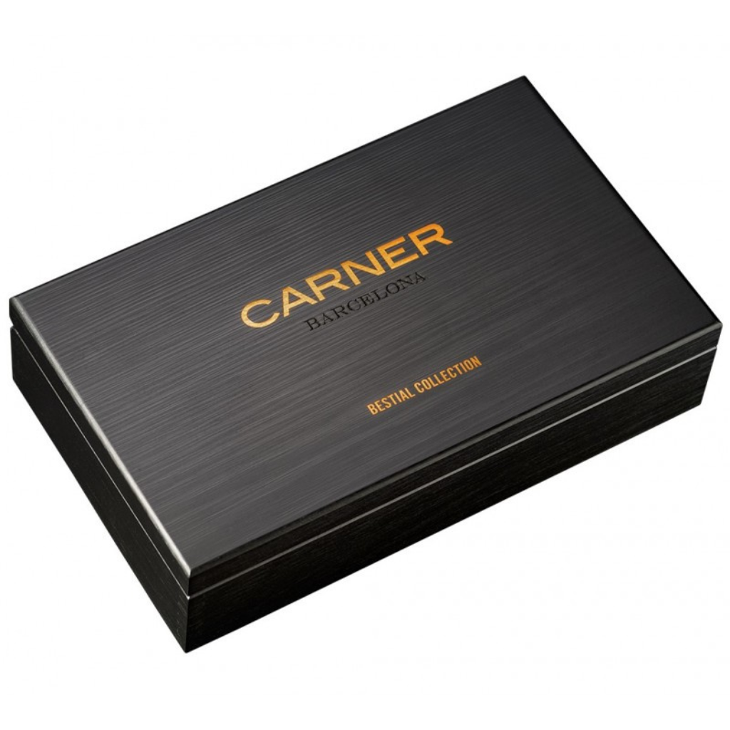 A sleek black rectangular box with a brushed texture features the Carner logo in gold and white, and "Bestial Collection Set" in smaller gold letters, reflecting the natural oud and animalic fragrance within from Carner Barcelona.