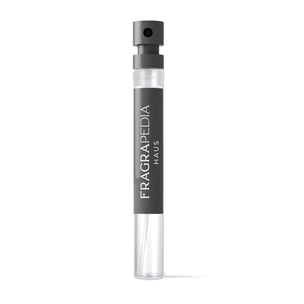 A small, clear glass perfume sample vial with a grey spray cap and label displays “Nobile 1942” in white. This upright vial contains 1001 Exceptional Extrait by Nobile 1942, perfect for sampling an oriental spicy or Arabian nights fragrance.