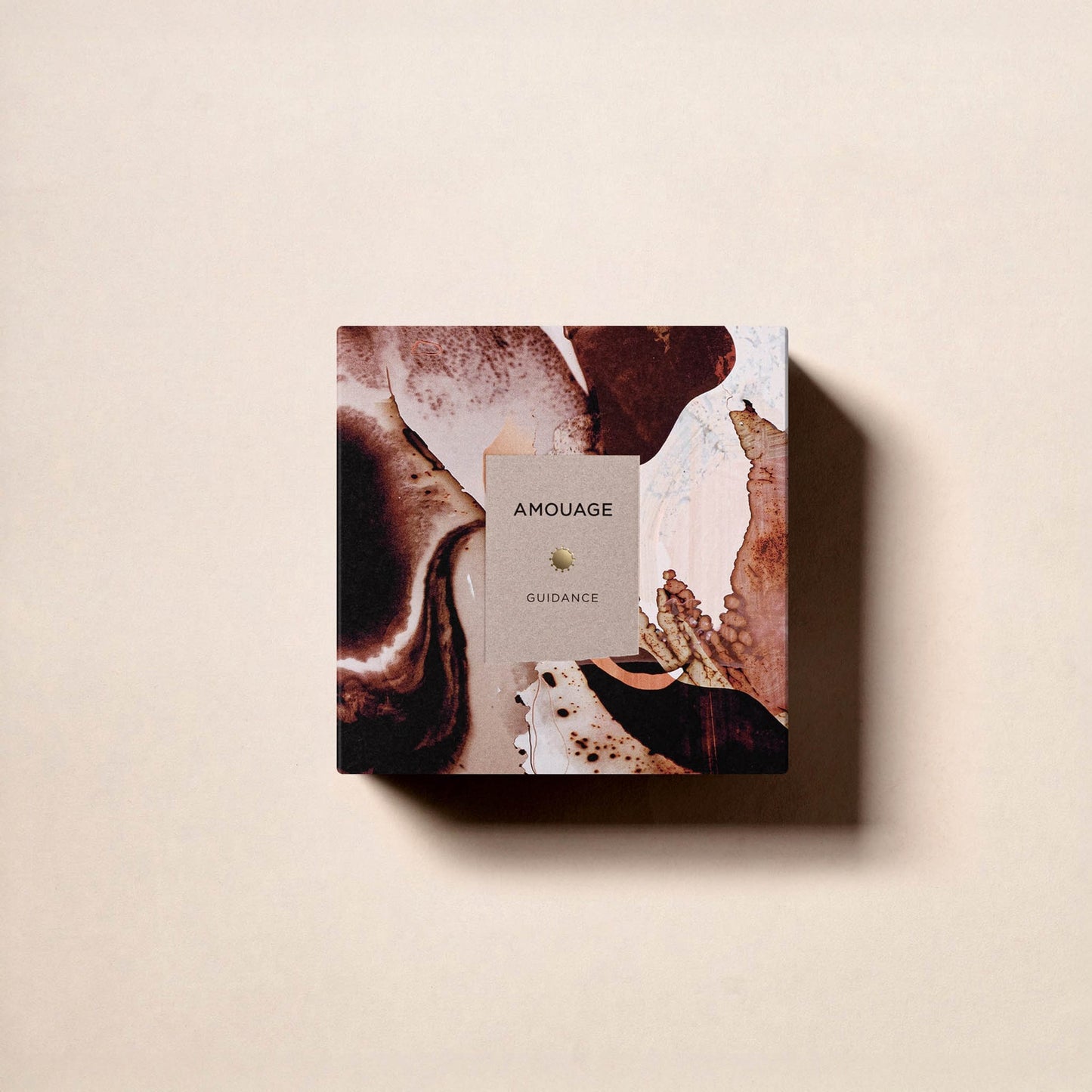 The square box of Fragrapedia Haus Guidance Eau de Parfum features an abstract brown and cream marbled design on a light beige background.