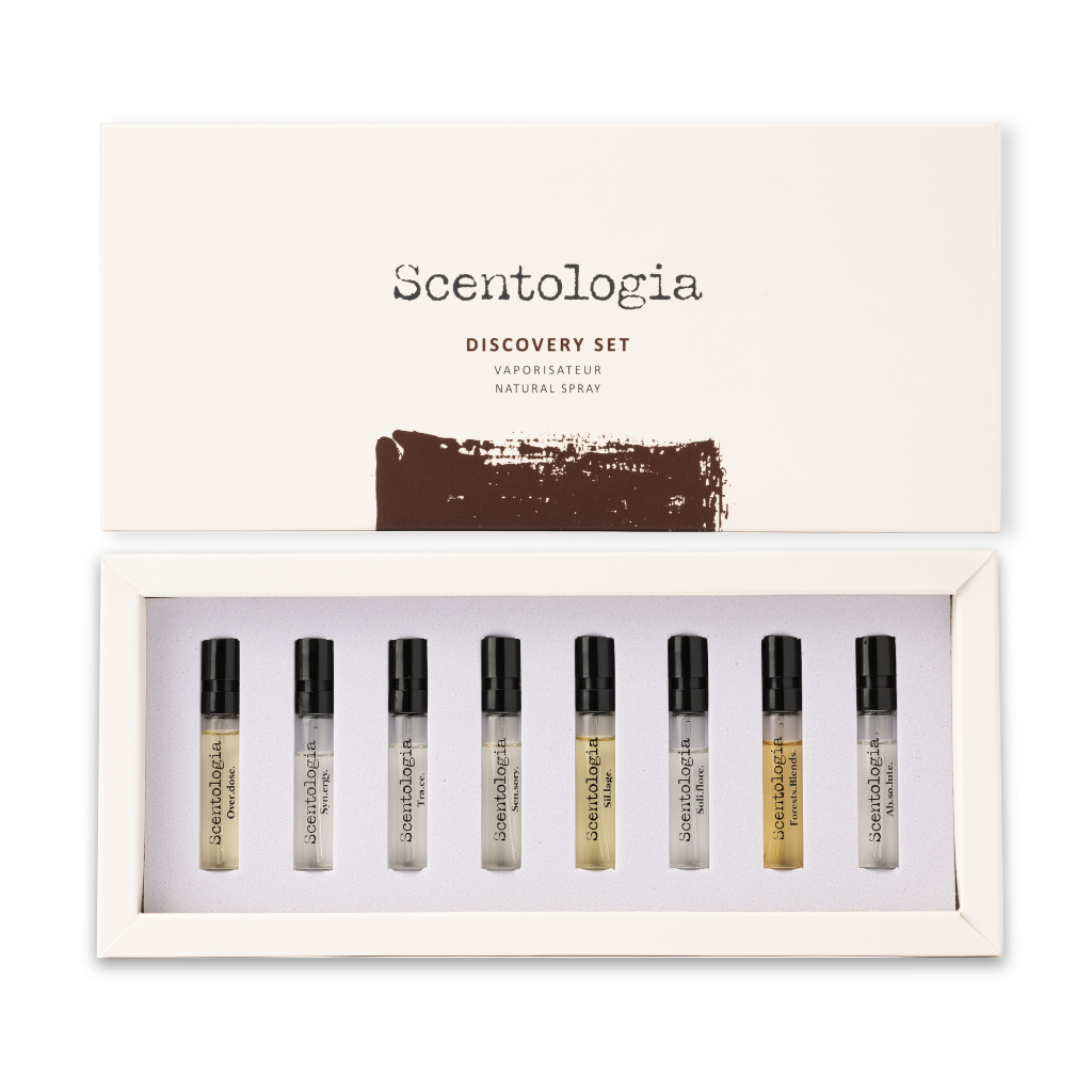 An open box labeled "Discovery Set 9x2ML - Scentologia" displays nine sample perfume vials neatly arranged in a white foam insert, inviting you to discover the unique scents by Scentologia.