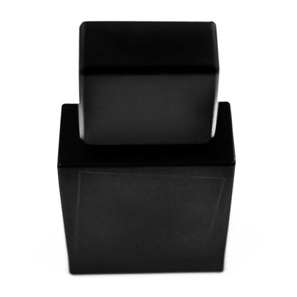 A sleek black rectangular bottle with a matching square cap, shown on a white background, reflects the elegant design and refined aura of Filippo Sorcinelli's UNUM LAVS EDP perfume.