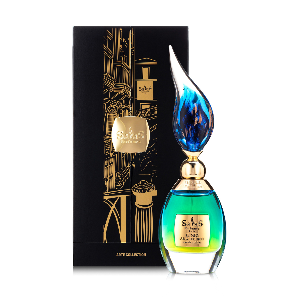 A blue and green perfume bottle with a gold label and flame-shaped stopper stands before a black and gold box labeled IL MIO ANGELO BLU EDP by Salas Art Perfumes, part of the Arte Collection featuring a rich agarwood fragrance.