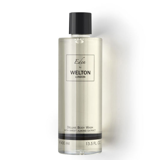 A clear 400ml (13.5 fl oz) plastic bottle labeled Welton London EDEN DELUXE BODY WASH WITH SWEET ALMOND EXTRACT features a black cap; the gentle, transparent wash with natural ingredients suits sensitive skin.
