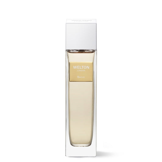 A rectangular glass bottle of Welton Baicha EDP, with pale yellow liquid and a white cap, is labeled WELTON LONDON and BAICHA. It sits partially in clear packaging, highlighting the luxury fragrance against a white background.
