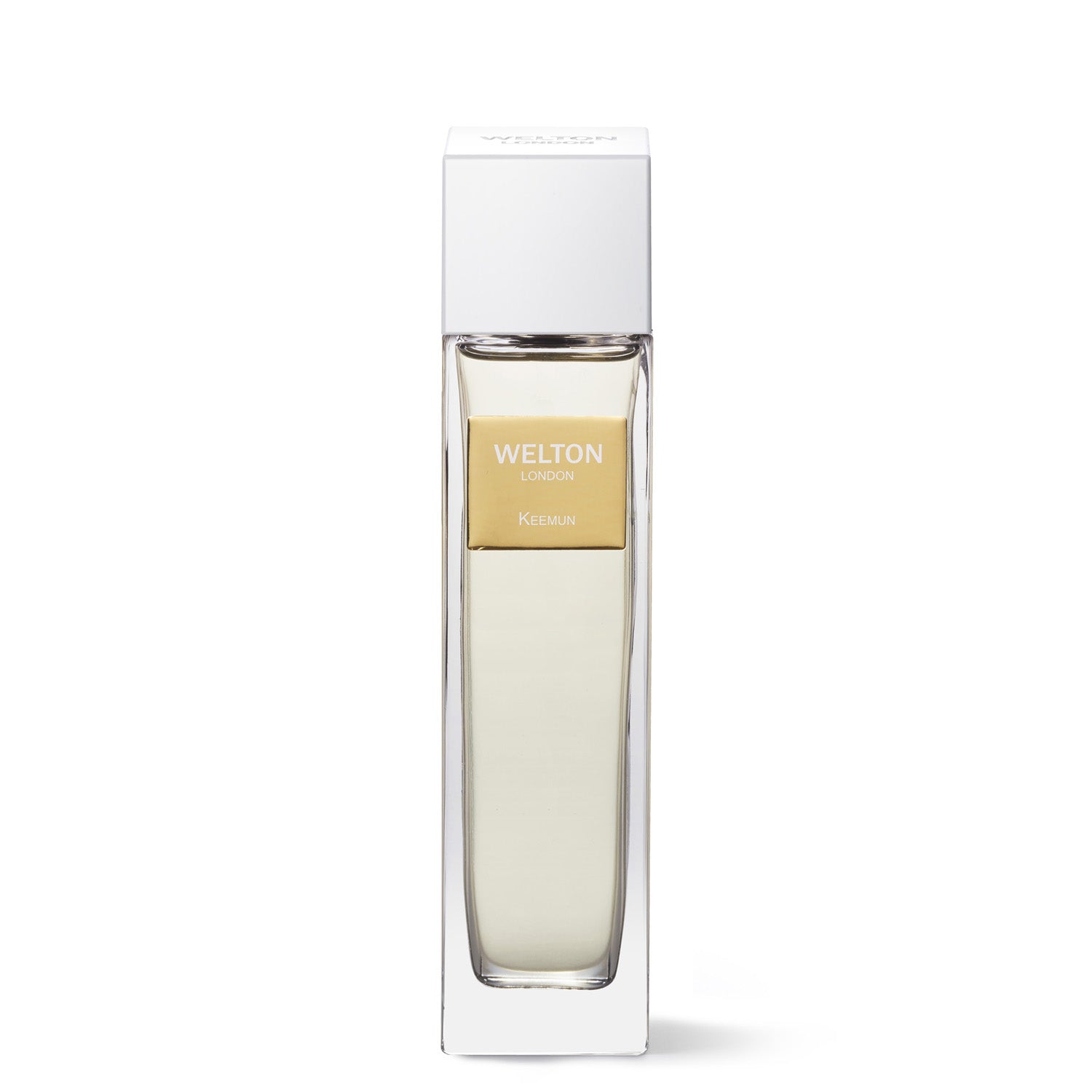 A rectangular glass bottle of Keemun EDP by Welton, filled with light liquid and a gold label, stands upright in a white luxury collection box.