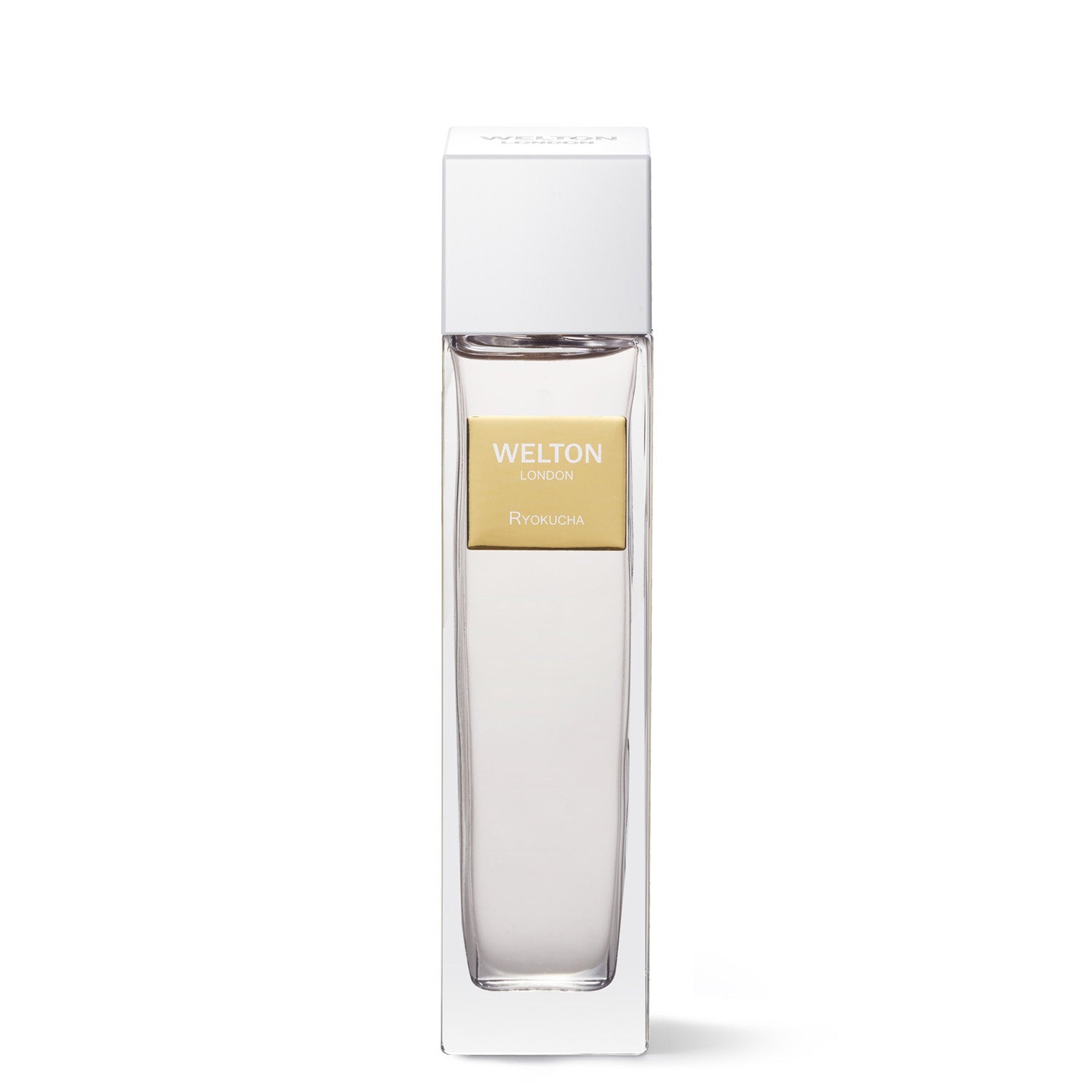 A clear glass bottle labeled Welton Ryokucha EDP with a gold label stands in a tall white box, set against a plain white background—an elegant green tea perfume from Welton in luxurious packaging.
