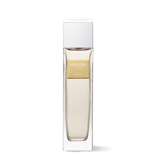 A tall, rectangular glass bottle with a white cap, labeled "Welton Sencha" in gold letters, holds light yellow Sencha EDP and evokes citrus aromatic and green tea notes. Displayed on a plain white background.