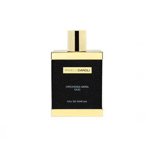 A rectangular black perfume bottle with gold accents and cap, labeled “Orchidea Nera Eau de Parfum - Angelo Caroli” by ANGELO CAROLI. This luxurious woody floral unisex scent is showcased against a white background.