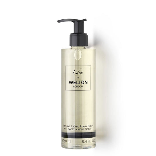 A clear plastic pump bottle of Welton London EDEN DELUXE LIQUID HAND SOAP WITH SWEET ALMOND EXTRACT, inspired by Marseille soap and made with natural ingredients, contains 250 ml (8.4 fl. oz) of pale yellow soap.