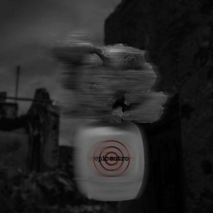 A blurred photo displays DELIRE DE VOYAGE EPICENTRO "travel delirium epicenter" Eau de Parfum by Filippo Sorcinelli, featuring a red target logo and 'epicentro' text, set against an obscure dark background with soft shapes.