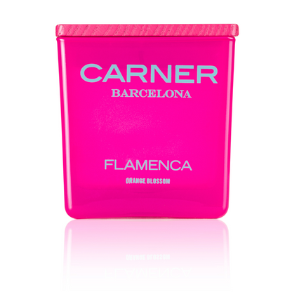 A bright pink rectangular FLAMENCA CANDLE by GIFTS, inspired by Carner Barcelona, with a matching pink lid and bergamot accents, stands against a white background.