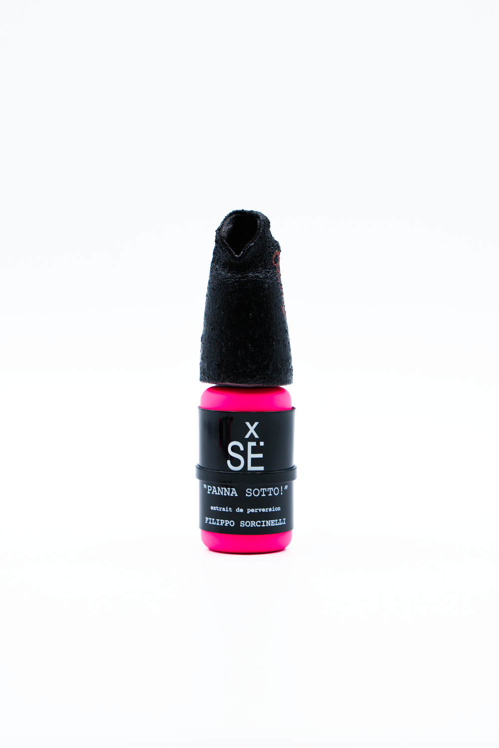 Small bottle with black cap and pink base on a white background