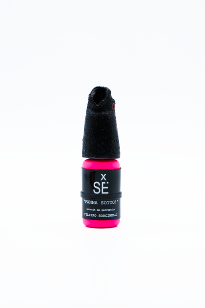 Small bottle with black cap and pink base on a white background