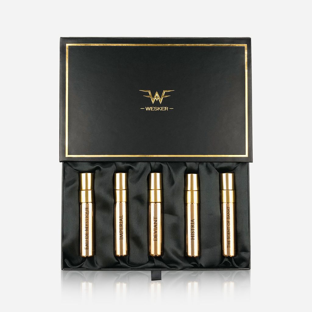 The Wesker Discovery Set features five gold Extraits de Parfum vials in a satin-lined, elegant black box with gold trim and the Wesker logo.