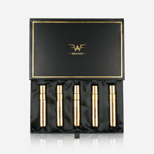 The Wesker Discovery Set features five gold Extraits de Parfum vials in a satin-lined, elegant black box with gold trim and the Wesker logo.