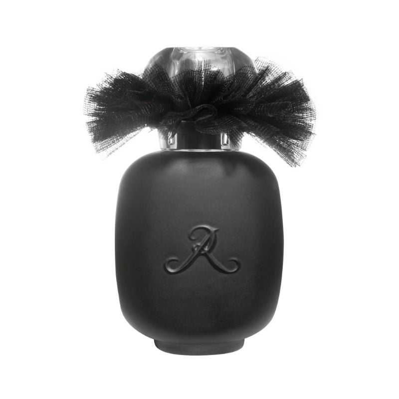 BALLERINA N°3 Eau de Parfum by LES PARFUMS DE ROSINE features a matte black bottle with a sheer black ribbon, clear faceted cap, and embossed letter A. Part of the Ballerina Collection, it holds an elegant woody floral fragrance.