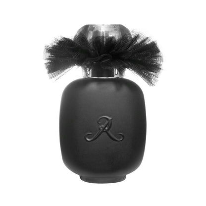 BALLERINA N°3 Eau de Parfum by LES PARFUMS DE ROSINE features a matte black bottle with a sheer black ribbon, clear faceted cap, and embossed letter A. Part of the Ballerina Collection, it holds an elegant woody floral fragrance.