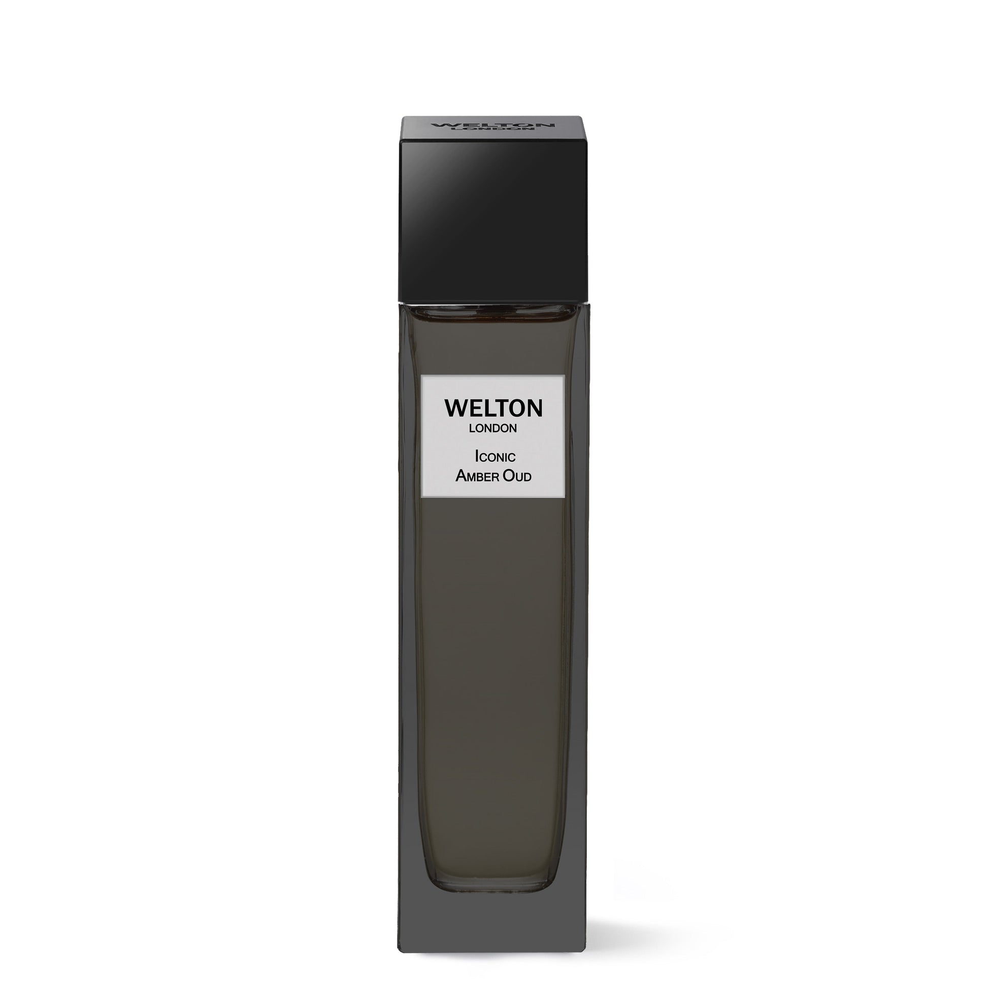 A tall, rectangular Welton Iconic Amber Oud EDP bottle with a black cap and white label from the Luxury Collection, displays an elegant Oriental scent against a plain white background.