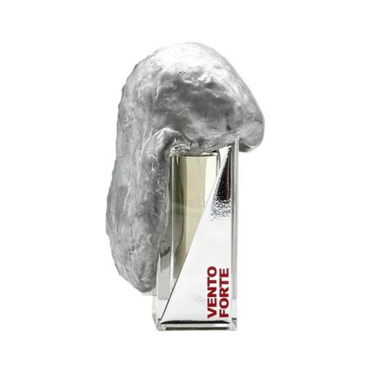 A clear, rectangular bottle labeled VENTO FORTE “strong wind” Eau de Parfum by Filippo Sorcinelli features a striking silver sculpture, capturing a scent of liberation inspired by the Exodus narrative.