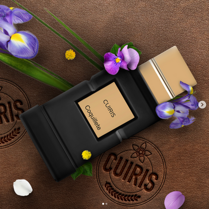 A black and gold bottle of CUIRIS Eau de Parfum by Coquillete rests on embossed brown leather, surrounded by purple and yellow flowers with green leaves, evoking the elegance of modern French perfumery and refined leather notes.