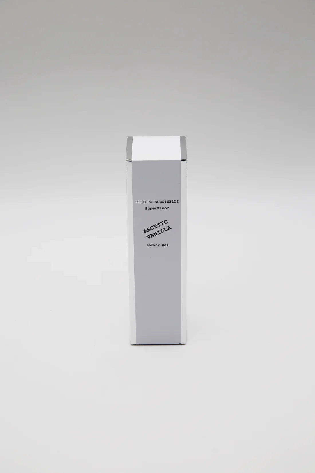 A tall, white rectangular box with black text stands upright against a plain light gray background. The text includes Filippo Sorcinelli, SUPERFLUO ASCETIC VANILLA SHOWER GEL, and 250 ml shower gel.