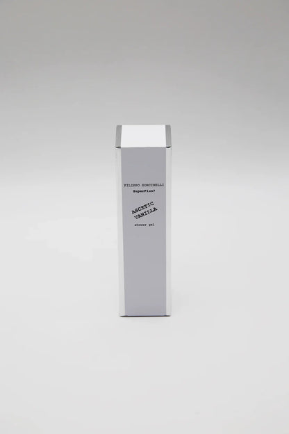 A tall, white rectangular box with black text stands upright against a plain light gray background. The text includes Filippo Sorcinelli, SUPERFLUO ASCETIC VANILLA SHOWER GEL, and 250 ml shower gel.