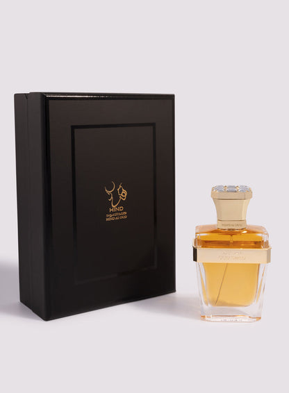 Oud Zayed Parfum by Hind Al Oud, featuring a gold-capped bottle and elegant gold-accented black box, is displayed on a light background—embodying the essence of Emirati fragrance.