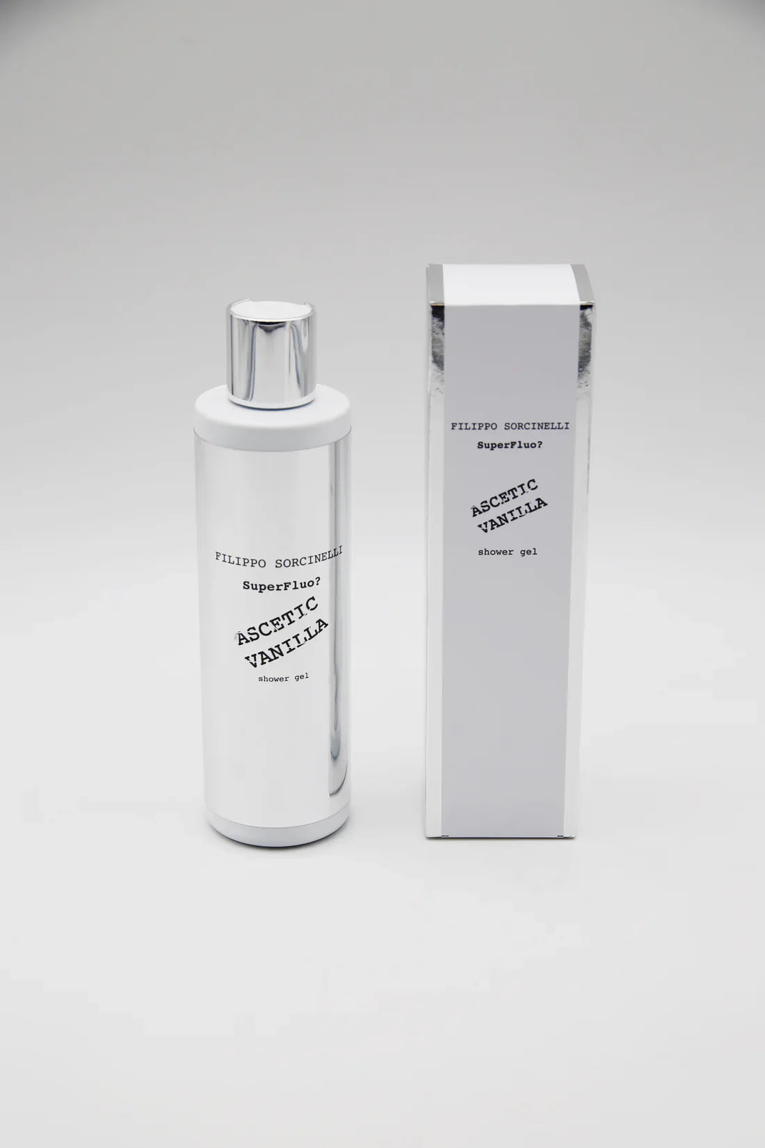 A 250 ml Filippo Sorcinelli SUPERFLUO ASCETIC VANILLA SHOWER GEL stands beside its matching rectangular box, both displaying minimalist black text on a white background.