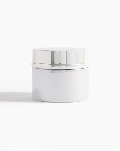 A sleek white jar with a shiny silver lid from Hind Al Oud, perfect for holding Pink Smoke Dokhoon—an elegant offering by Hind Al Oud—against a clean white background.