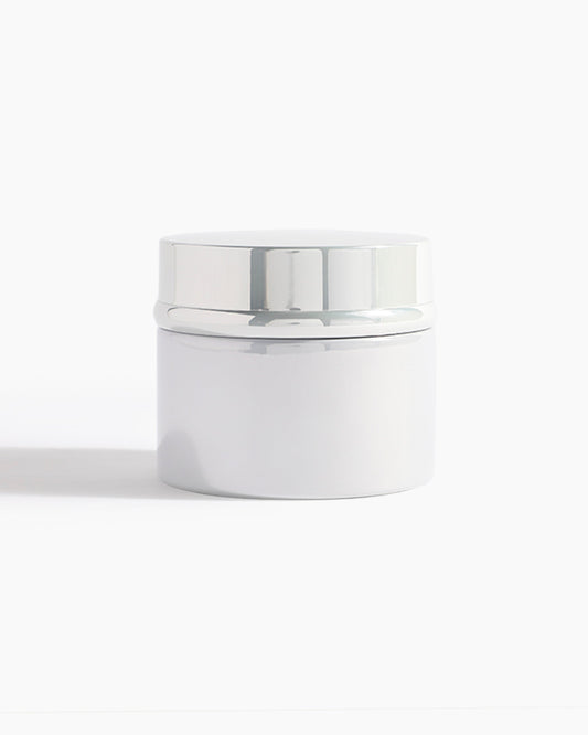 A sleek white jar with a shiny silver lid from Hind Al Oud, perfect for holding Pink Smoke Dokhoon—an elegant offering by Hind Al Oud—against a clean white background.