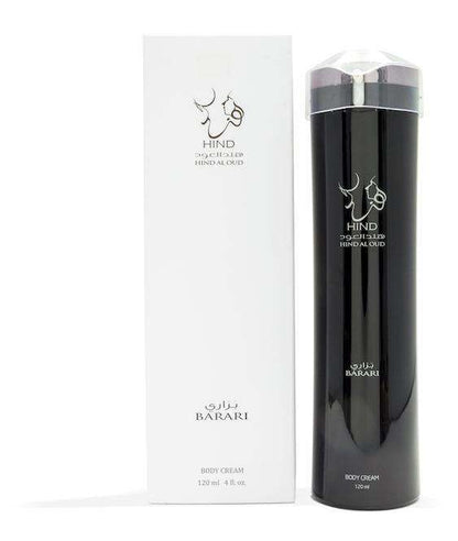 A tall black bottle and a white box of Hind Al Oud Barari Body Lotion, inspired by the Arabian Desert collection, display gold and white Arabic and English text. The bottle contains 120 ml (4 fl. oz.) of lotion.