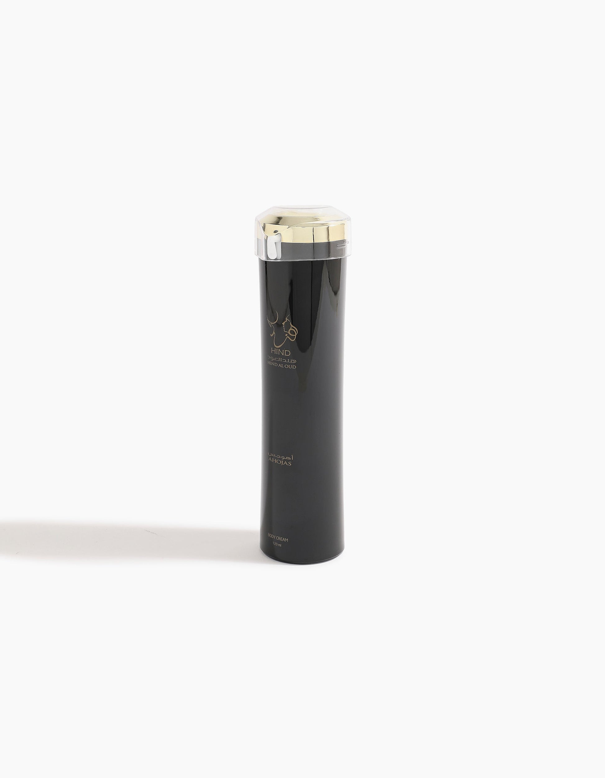 Ahojas Body Lotion by Hind Al Oud stands tall in a sleek black bottle with a silver and gold cap, featuring gold accents on its design—hinting at the luxurious fig and tobacco notes inside.
