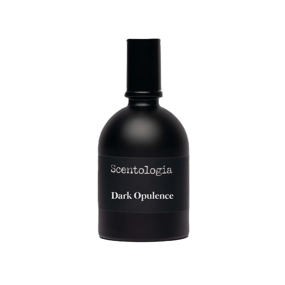 A matte black bottle of Dark Opulence Eau de Parfum by Scentologia stands upright against a light gray background, embodying luxury with its alluring oriental woody scent.
