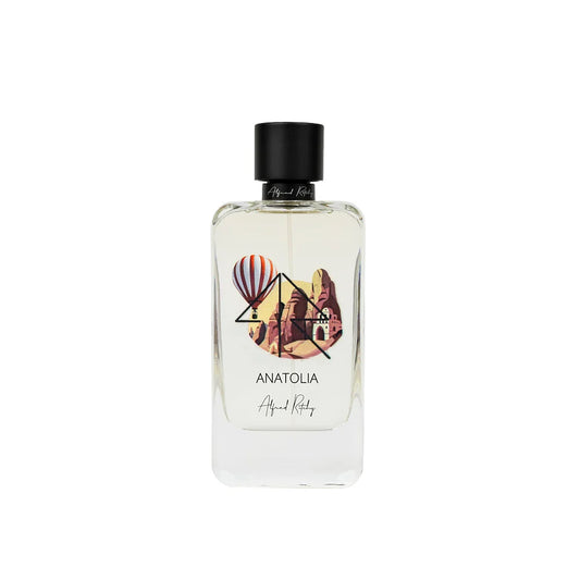 The ANATOLIA Eau de Parfum by Alfred Ritchy is a 100ml clear bottle decorated with hot air balloons and rocky landscapes; its minimalist look and black cap evoke the vanilla sandalwood scent inside.