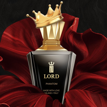 A luxurious black and gold unisex PHANTOM Eau De Parfum by LORD MILANO, featuring a crown-shaped cap, is displayed before flowing red fabric on a dark background. The bottle reads "Made with love, Milano / Italy.