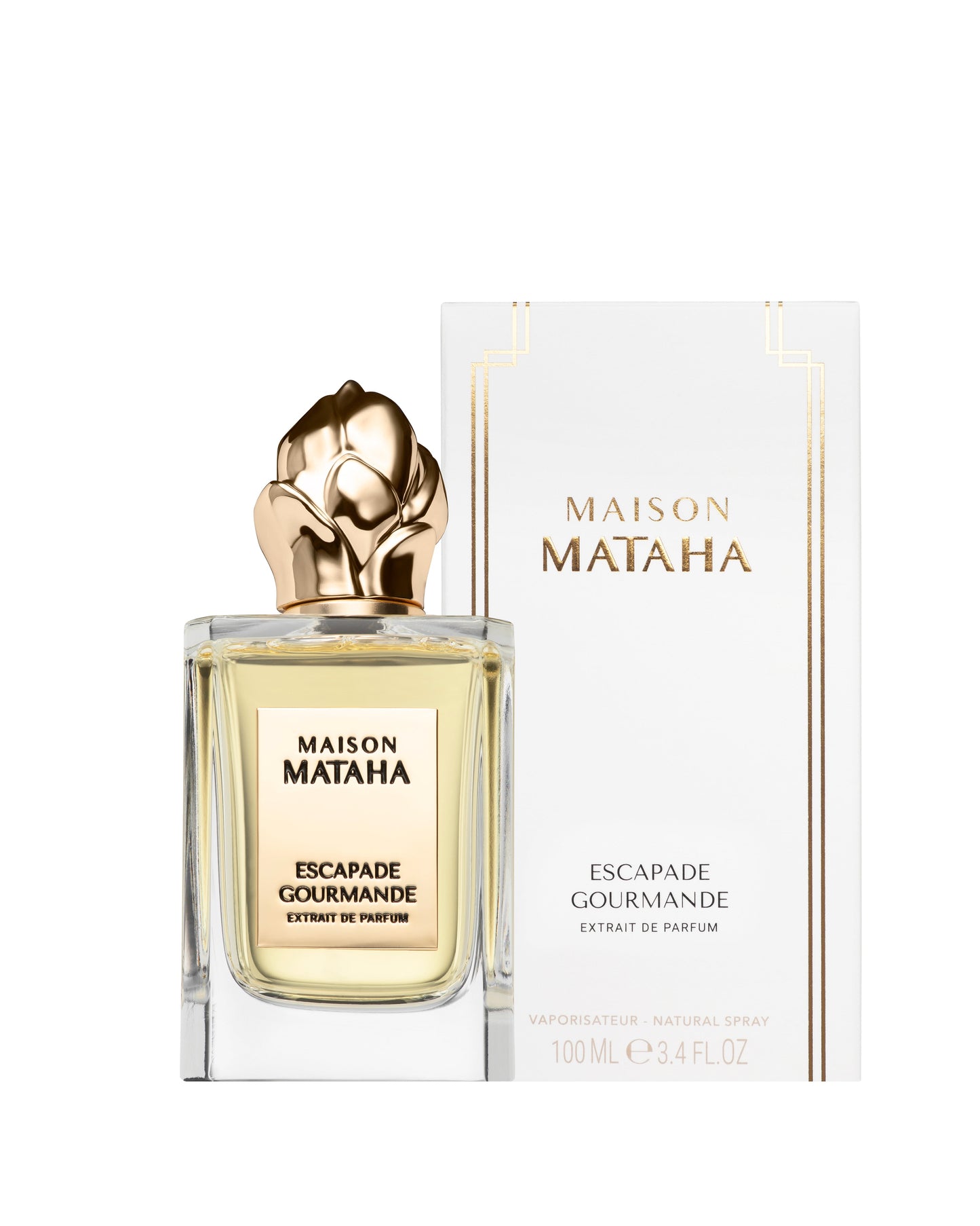 The 100 mL Escapade Gourmande Extrait de Parfum by Maison Mataha features a vanilla fragrance reminiscent of crème brûlée, presented in a bottle with a gold floral cap and displayed before its white and gold packaging.