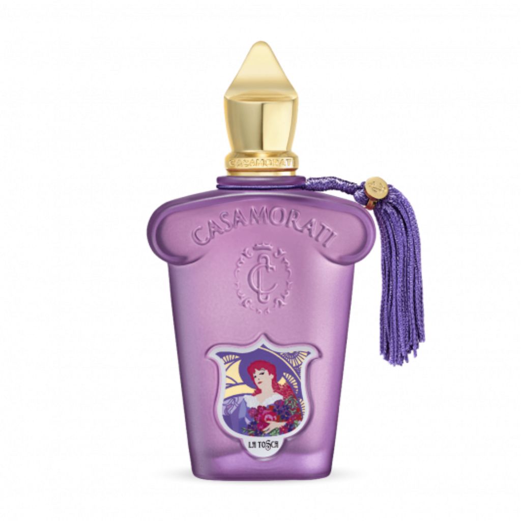 A purple perfume bottle with a gold cap, purple tassel, and ornate label featuring a red-haired woman. Embossed with CASAMORATI and Xerjoff's Casamorati 1888 La Tosca Eau de Parfum, it holds a signature floral scent.