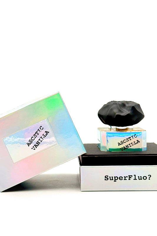 Perfume bottle labeled 'SuperFluo?' with a colorful box on a white background
