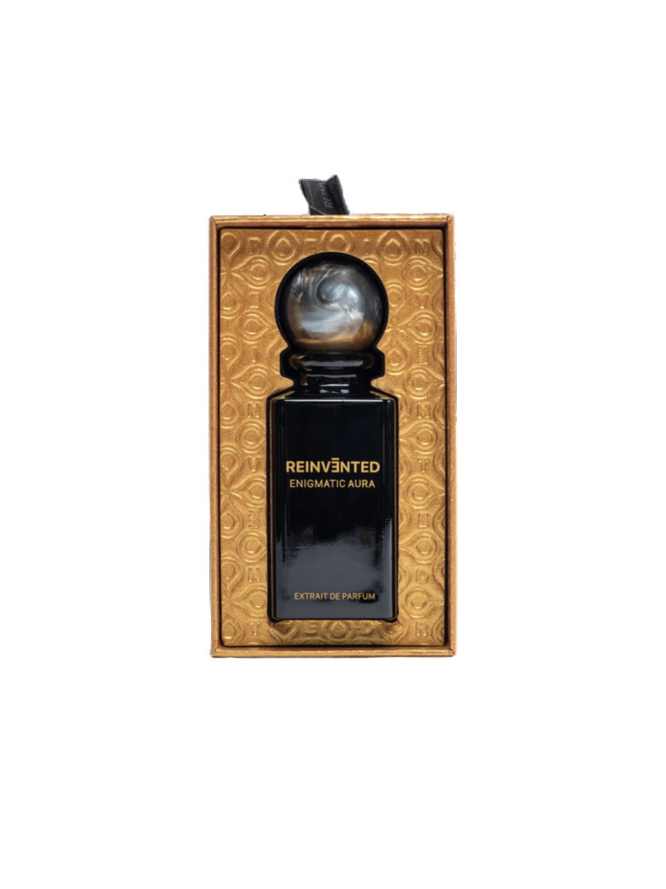 A black REINVĒNTED ENIGMATIC AURA Extrait de Parfum bottle with a round marbled cap sits in a textured gold box with circular patterns, showcasing vegan, cruelty-free elegance.
