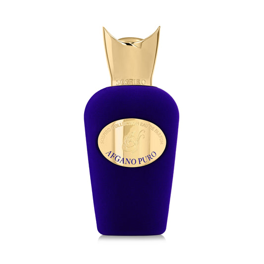 Afgano Puro Eau de Parfum by SOSPIRO comes in a royal blue, velvet-textured bottle with a gold cap and oval label. Its elegant design evokes jazz club vibes, hinting at sophistication and allure against a white background.