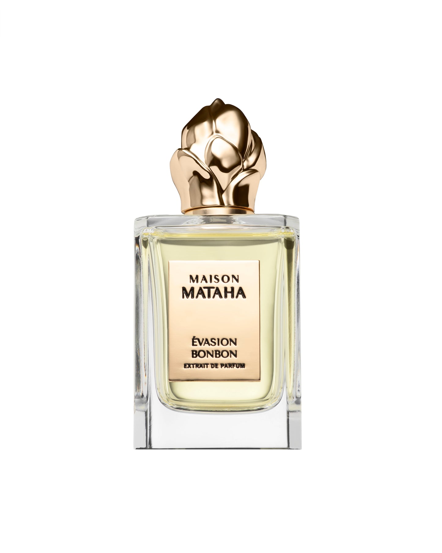 The Maison Mataha Evasion Bonbon Extrait de Parfum features pale gold liquid in a clear glass bottle with a sculpted gold floral cap, evoking the essence of a sweet treat—all set against a white background.
