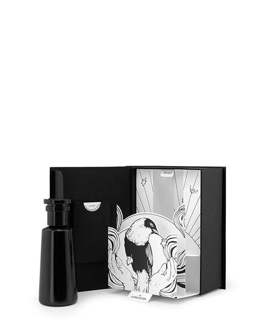 "Creator" Eau de parfum by Argentum Black bottle and packaging with hummingbird illustration on a white background