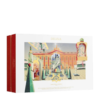 The Parfums de Marly Delina Gift Set comes in a rectangular box with red sides, a white border, and charming pastel palace-themed artwork, celebrating the floral feminine fragrance inside.