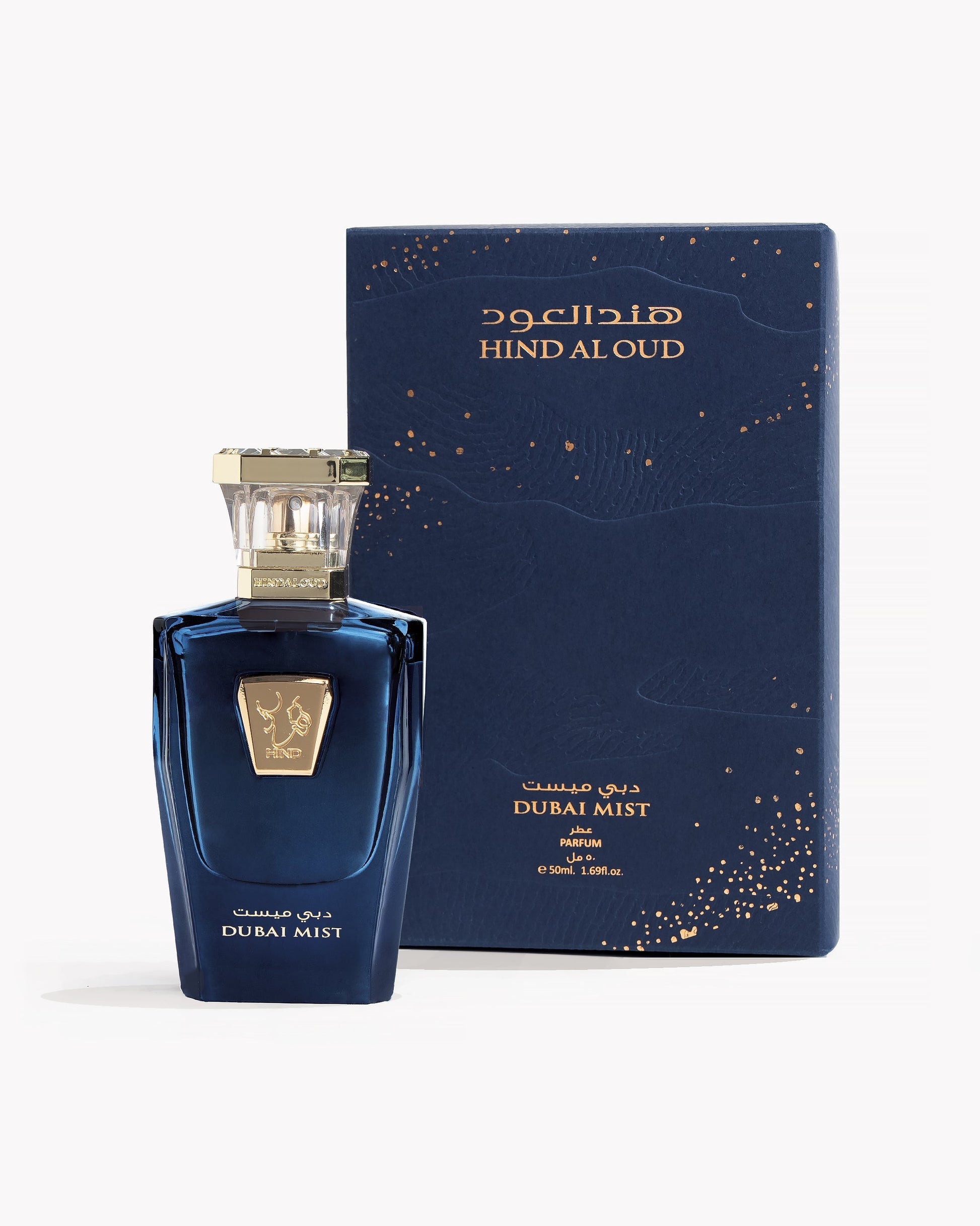 Dubai Mist Blue perfume bottle and packaging with 'Hind Al Oud' branding on a white background