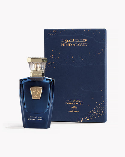 Dubai Mist Blue perfume bottle and packaging with 'Hind Al Oud' branding on a white background