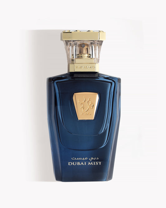 Dubai Mist by Hind Al Oud 
Blue perfume bottle with gold accents labeled 'Dubai Mist' on a light gray background