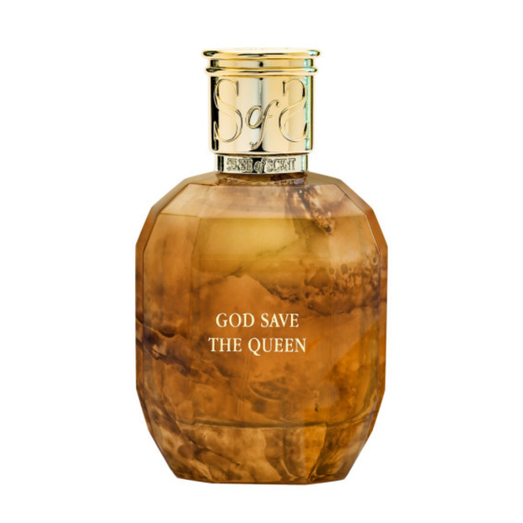 The GOD SAVE THE QUEEN Eau de Parfum by Sense of Scent features a faceted amber bottle with a gold cap and white lettering, capturing British sophistication and timeless elegance.