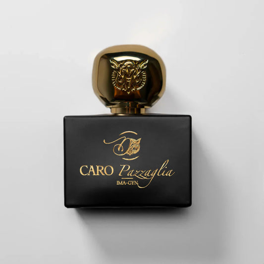 Black and gold lettering  fragrance boxttle on white background brand Caro Pazzaglia IMA-GYN Perfume Extract