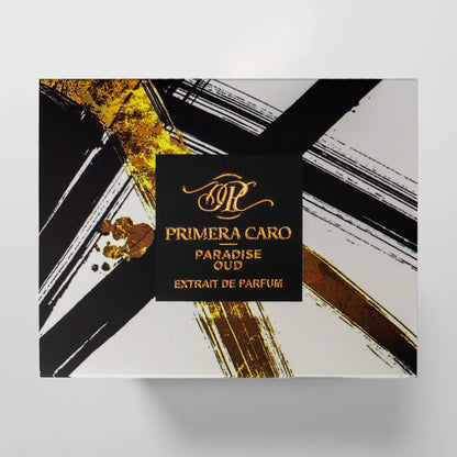 Black and gold lettering  fragrance BOX on white background brand PRIMERA Caro PARADISE OUD EXTRAIT DE PARFUM 