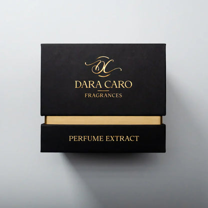 Black and gold words Dara Caro  Fragrances Perfume Extract fragrance box on white background 